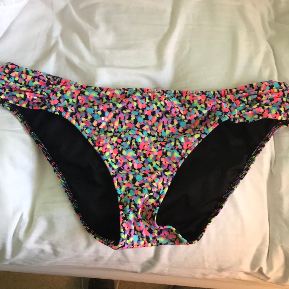 Vibrant colorful full coverage bikini bottom.